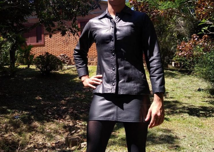 Crossdresser in leather skirt and jacket