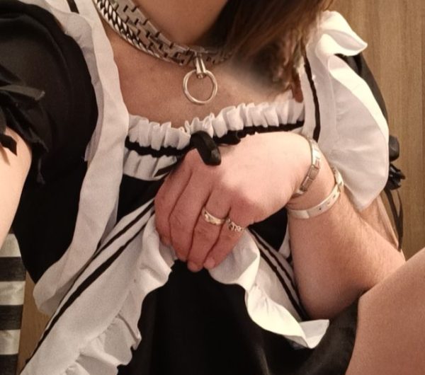 Sissy shows off her chastity cage